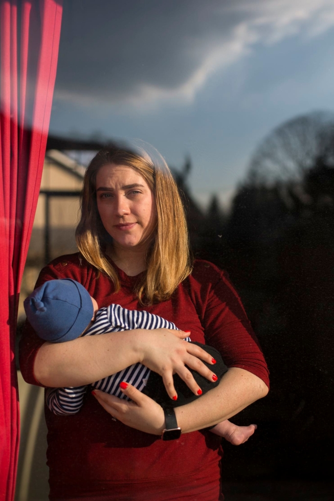 Amber Gorrow holds her 8-week-old son Leon at their home in Vancouver, Washington. He is too young for a measles vaccination right now, so his mother keeps him at home as much as possible to limit his exposure to the disease. Photo: Alisha Jucevic / The Washington Post