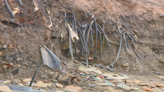 Coastal erosion has exposed an old landfill site in Northumberland County, which is leaking waste onto Lynemouth Beach and into the sea. There are more than 1,200 coastal landfill sites in England. Photo: ITV News