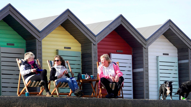 People in Blyth in Northumberland, UK, enjoying the record warm day on 25 February 2019, the warmest winter day on record. Photo: Sky News