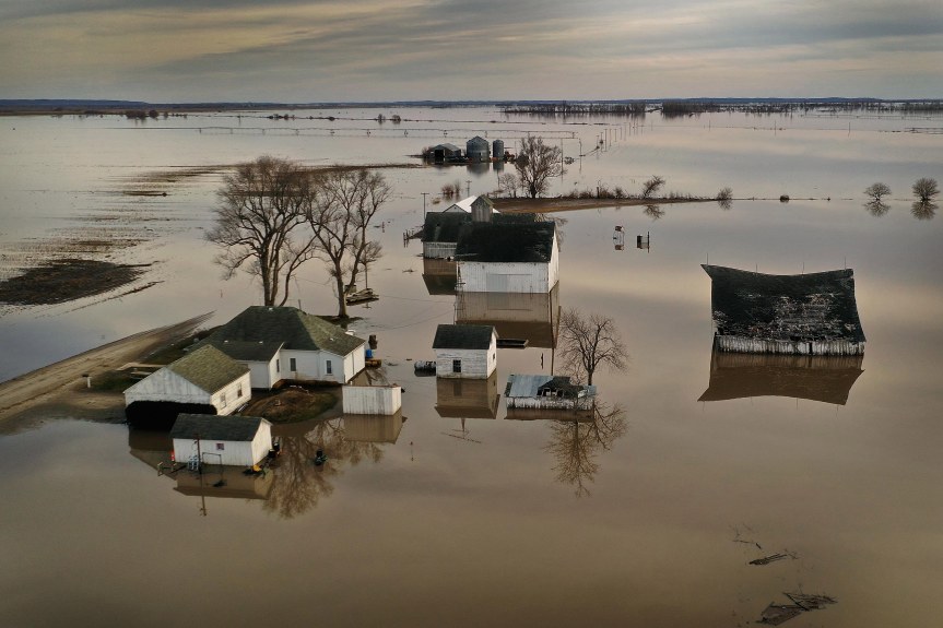 Floodwater surrounds a farm on 22 March 2019 near Craig, Missouri. Midwest states are battling some of the worst floodings they have experienced in decades as rain and snowmelt from the recent "bomb cyclone" has inundated rivers and streams. At least three deaths have been linked to the flooding. Photo: Scott Olson / Getty Images