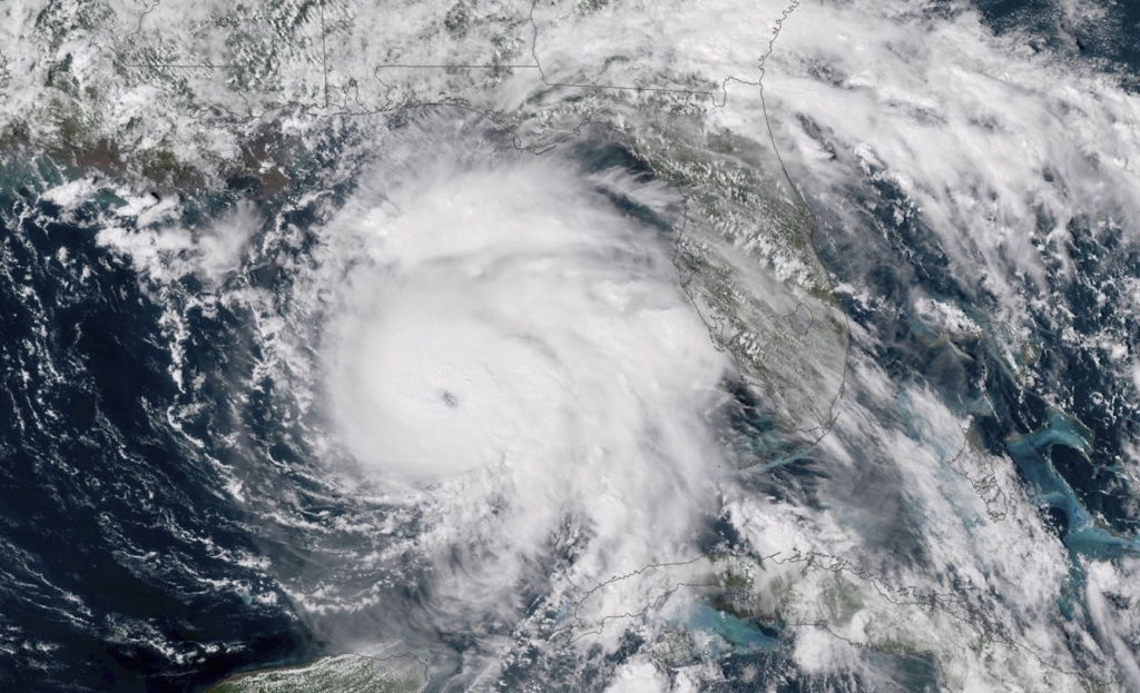 This 9 October 2018 satellite image provided by NOAA shows Hurricane Michael, center, in the Gulf of Mexico. Weather forecasters have posthumously upgraded last fall’s Hurricane Michael from a Category 4 storm to a Category 5. The National Oceanic and Atmospheric Administration announced the storm’s upgraded status on 19 April 2019, making Michael only the fourth storm on record to have hit the U.S. as a Category 5 hurricane. Photo: NOAA / AP
