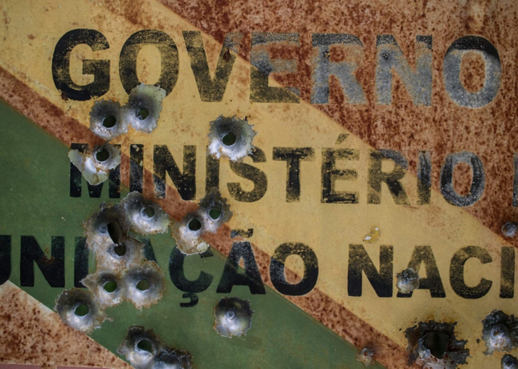 A sign from Brazil’s National Indian Foundation (FUNAI) declaring the Uru-Eu-Wau-Wau territory in Rondônia state, Brazil to be “Protected Land” was shot following an intrusion in January 2019. Photo: Gabriel Uchida / Amnesty International