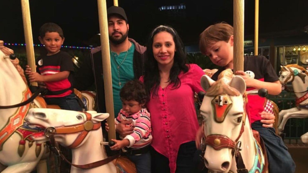 Jorge Miguel Del Valle, 28, poses with his wife, Rotcely Hernandez, 28, and their three children at Disney Springs on 31 August 2017. Del Valle fled Puerto Rico after Hurricane María and lives with his family in Panama City. Photo: Jorge Miguel Del Valle