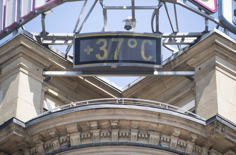 A sign shows 37 degrees Celsius at a building in the city of Stuttgart, Germany, Wednesday, 26 June 2019. Germany and Europe is hit by a heatwave with temperatures near 40 degrees. Photo: Marijan Murat / dpa