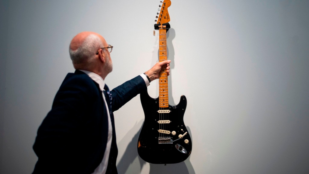 The “Black Strat” guitar, from the personal guitar collection of rock and roll legend David Gilmour of Pink Floyd, on display for auction, 21 June 2019. Photo: Sky News