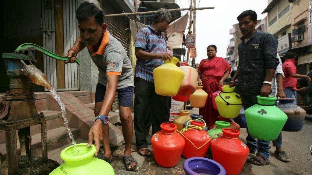 Indians fill vessels with drinking water in Chennai, capital of the southern Indian state of Tamil Nadu, Wednesday, 19 June 2019. Photo: R. Parthibhan / AP Photo