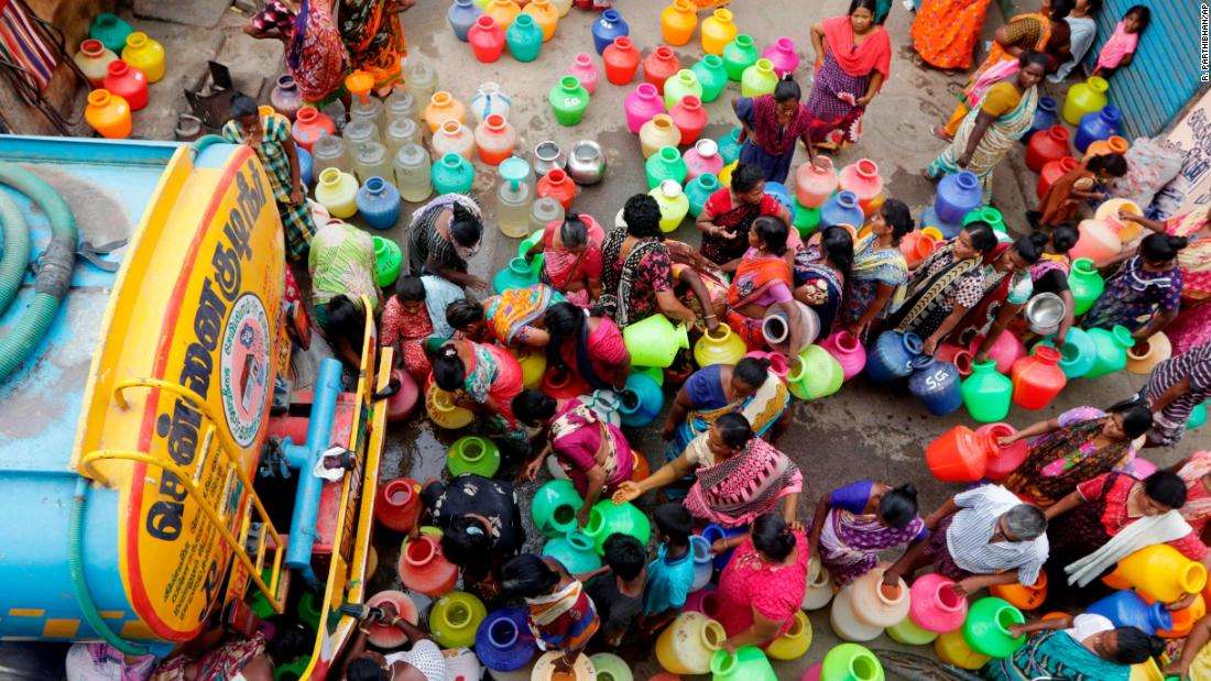 Indians stand in queues to fill vessels with drinking water from a water tanker in Chennai, capital of the southern Indian state of Tamil Nadu, Wednesday, 19 June 2019. Millions of people are turning to water tank trucks in the state as house and hotel taps run dry in an acute water shortage caused by drying lakes and depleted groundwater. Some private companies have asked employees to work from home and several restaurants are closing early and even considering stopping lunch meals if the water scarcity aggravates. Photo: R. Parthibhan / AP Photo