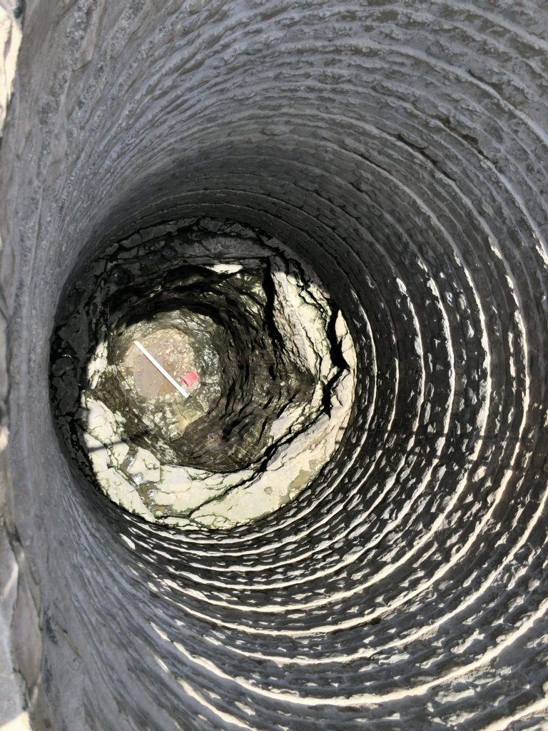The dry well in Pangri BK village into which water is poured by a tanker every alternate day – leading to a dangerous skirmish at the lip of the well. Photo: Joydeep Gupta / The Third Pole