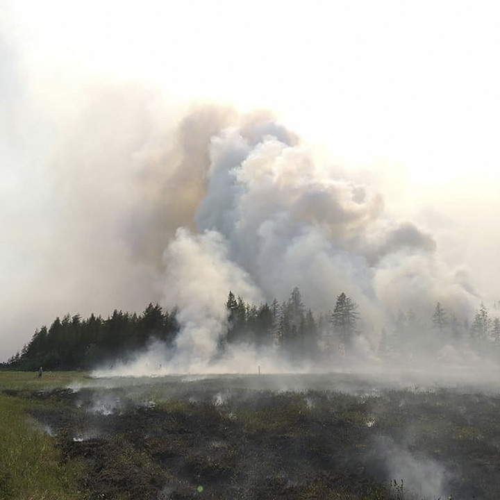 Smoke rises from a wildfire near the Batagai megaslump in Siberia, 16 July 2019. Graphic: The Siberian Times