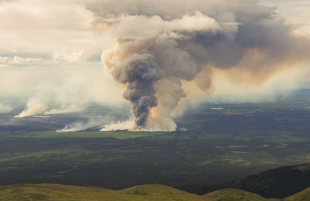 Smoke rises from the Swan Lake Fire, southwest of Anchorage, Alaska, on 18 June 2019. Photo: Alaska DNR