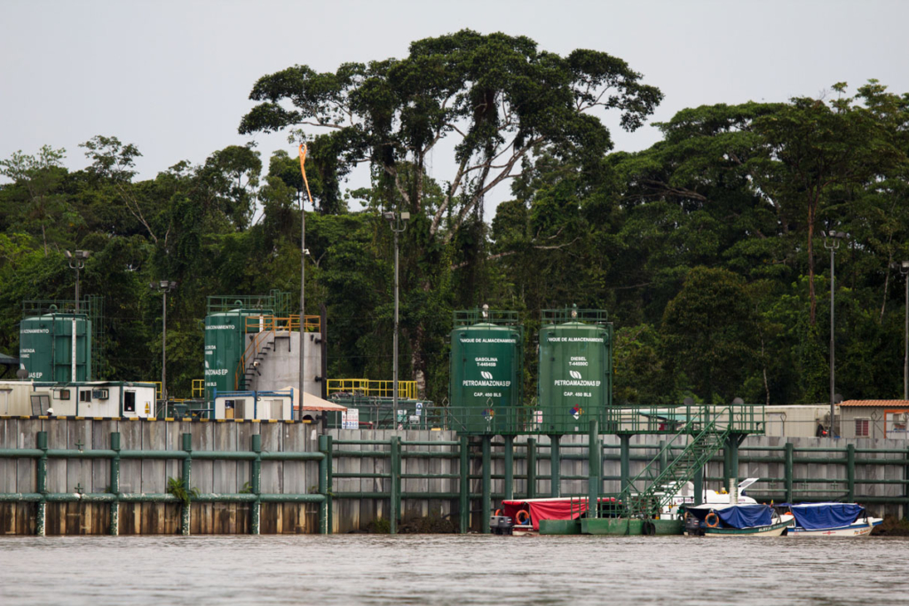 The Porto Mirando oil platform run by PetroAmazonas, which lies along the border of the Yasuni National Park in what is known as Block 43, or ITT. Block 43 was the last remaining bit of Yasuni that was free of oil activity, and the ITT initiative had been a symbol of hope for a new economic model. Photo: Kimberley Brown / Mongabay