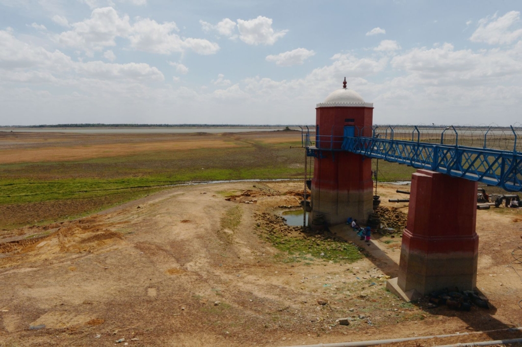 The Puzhal water reservoir, on the outskirts of Chennai, is dried out on 14 June 2019. Seasonal monsoon rains, which bring relief each year and replenish the country's water supplies, are late this year. Photo: Arun Sankar / AFP / Getty Images