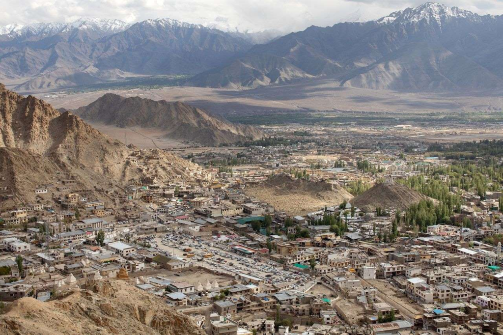 Aerial view of Leh, India in August 2019. The Ladakh region of northern India is one of the world’s highest, driest inhabited places. For centuries, meltwater from winter snows in the Himalayan mountains sustained the tiny villages dotting this remote land. Now, like many other places in India, parts of Ladakh are running short of water. A tourism boom has sent the summer population soaring, and the region’s traditional system of conserving water is breaking down. Photo: Gareth Phillips / The Wall Street Journal