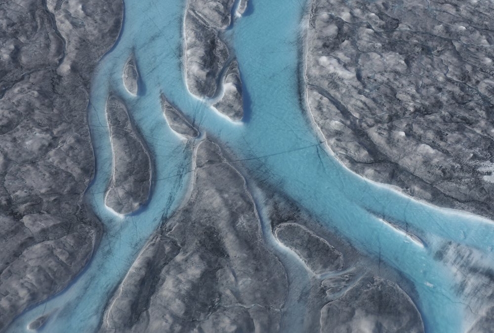 Large rivers of melting water form on an ice sheet in western Greenland on 1 August 2019 and drain into moulin holes that empty into the ocean from underneath the ice. The heat wave that smashed high temperature records in five European countries a passed over Greenland, accelerating the melting of the island's ice sheet and causing massive ice loss in the Arctic. Photo: Caspar Haarløv / Into the Ice / AP