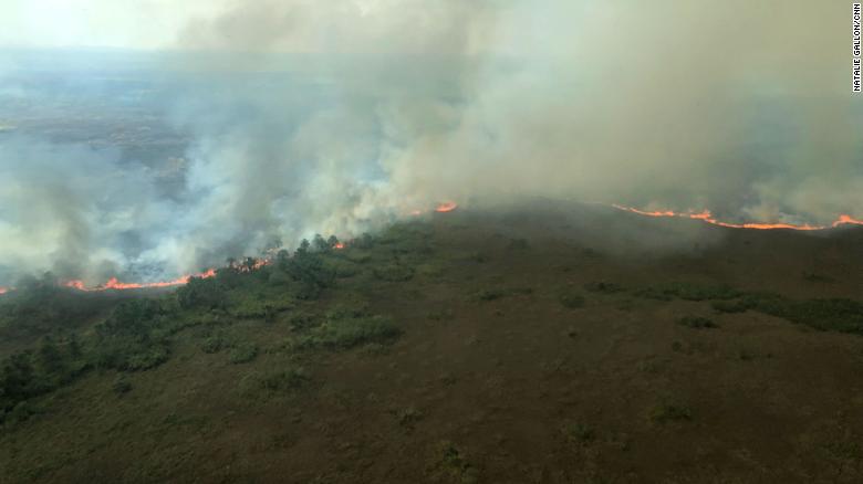 Aerial view of a wildfire burning in the Amazon rainforest near Porto Velho, Brazil, 26 August 2019. The Brazilian state of Rondonia has 6,436 fires burning so far this year in it, according to Brazil's National Institute for Space Research (INPE). Photo: Natalie Gallón / CNN