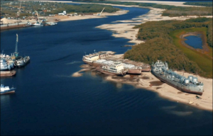 Aerial view of cargo ships stranded on the Lena river in Siberia, 27 August 2019. In the regional capital of Yakutsk, the Lena river water level dropped so suddenly that hundreds of cargo ships and smaller boats were left stranded in the sand. It was this summer’s unusual heat that caused the record drought. Photo: Ruslan Ochirov