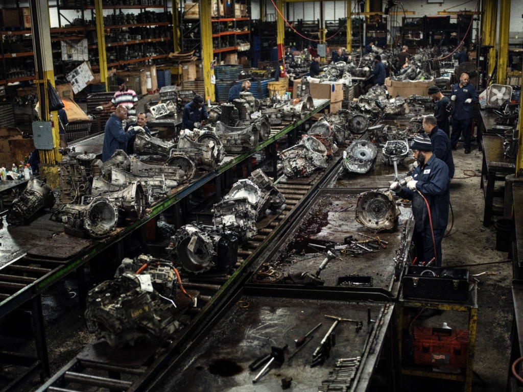 Breaking down transmissions at Buffalo Engine Components, where roughly 1,000 tons of engines and transmissions are recycled every week. Photo: Gregory Halpern / Magnum / The New York Times