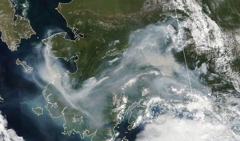 The Moderate Resolution Imaging Spectroradiometer (MODIS) on NASA’s Aqua satellite captured an image of thick wildfire smoke swirling over the state on 8 July 2019. Meteorologists in Fairbanks reported visibility had dropped to less than one mile due to smoke, and air quality sensors in the city reported skyrocketing levels of particulates in the air. Photo: NASA Earth Observatory