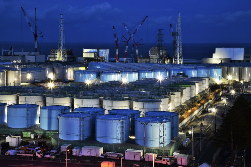 This 25 January 2019 photo shows water tanks containing contaminated water that has been treated at the Fukushima Dai-ichi nuclear plant in Okuma town, Fukushima prefecture, northeastern Japan. The utility company operating Fukushima's tsunami-wrecked nuclear power plant said Friday, 9 August 2019 it will run out of space for tanks to store massive amounts of treated but still contaminated water in three years, adding pressure for the government and the public to reach consensus on what to do with the water. Photo: Kyodo News / AP