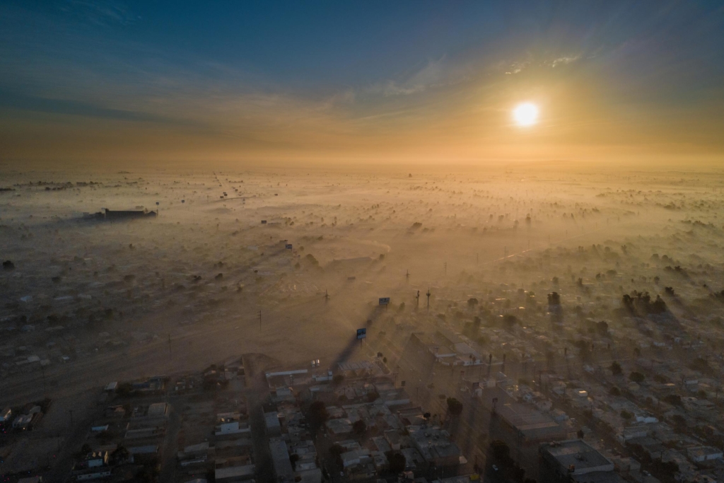This image, “Polluted New Year”, won photographer Eliud Gil Samaniego the  Environmental Photographer of the Year 2019 award in the “Sustainable Cities” category. It shows an aerial view of sunrise over Mexicali in Baja California, one of the most polluted cities in the world, on 1 January 2018. Photo: Eliud Gil Samaniego