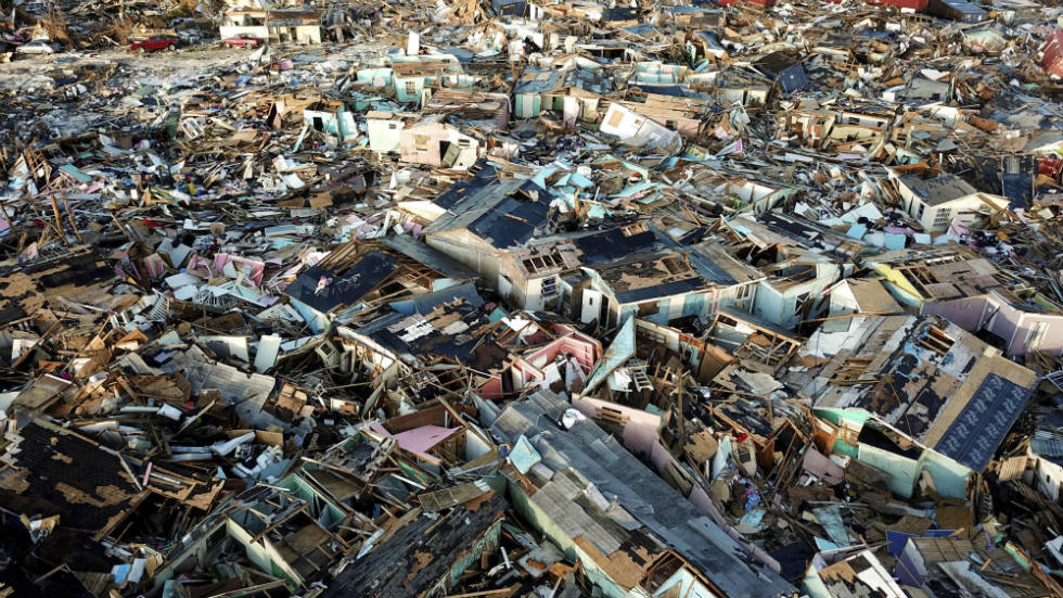 Homes lay in ruin in The Mudd neighborhood in the Marsh Harbour area of Abaco, Bahamas, on Monday, 9 September 2019, one week after Hurricane Dorian hit. Photo: Fernando Llano / AP Photo
