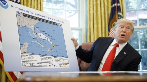 Trump speaks to the media about Hurricane Dorian in the White House in Washington on 4 September 2019. The projected path of Hurricane Dorian has been extended into Alabama by amateurish drawing with a Sharpie, Trump’s favorite type of pen. When asked by reporters whether the map had been altered, Trump said he didn’t know how it had been amended. Photo: Tom Brenner / Bloomberg