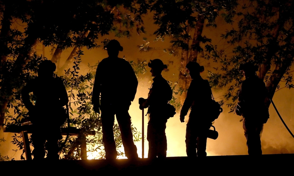 CalFire firefighters monitor a firing operation as they battle the Tubbs fire on 12 October 2017 near Calistoga, California. Photo: Justin Sullivan / Getty Images