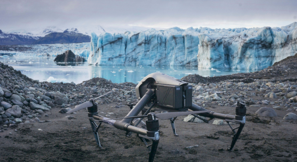 A drone is parked near a glacier. Dr. Kieran Baxter of the University of Dundee uses drones to create composite images that compare views of glaciers from 1980s aerial surveys to modern-day photos. Photo: Kieran Baxter / University of Dundee
