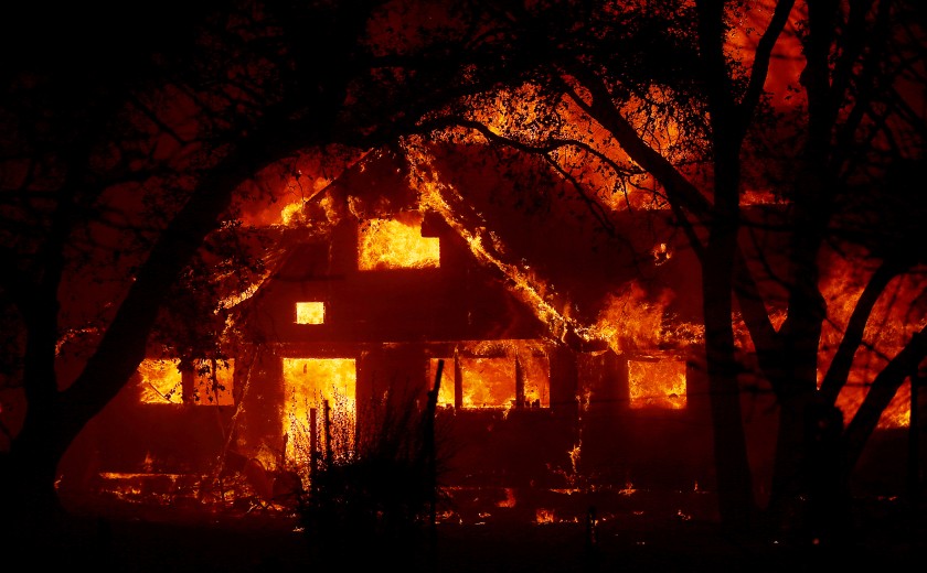 Near Healdsburg, California a ranch house along State Highway 128 is consumed by the Kincade fire early Sunday, 27 October 2019. Photo: Luis Sinco / Los Angeles Times