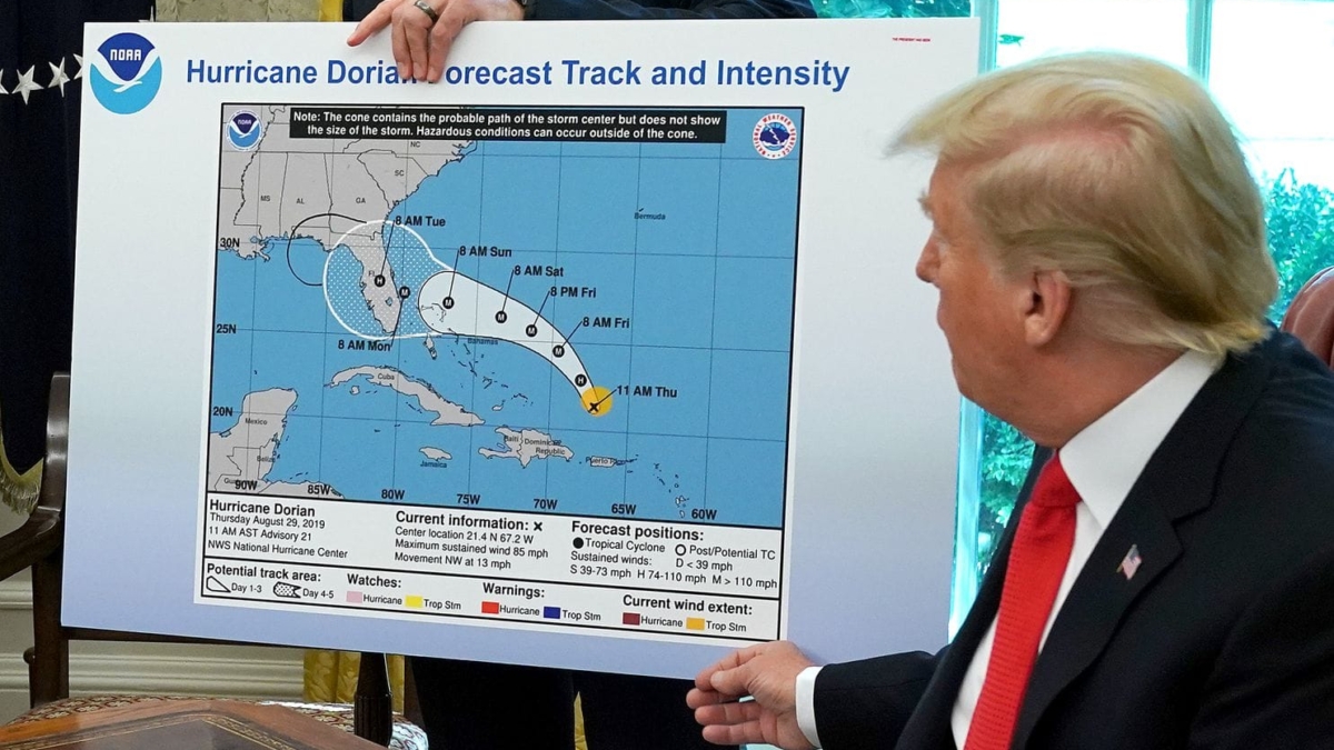 Trump refers to a map, modified using a Sharpie, while talking to reporters following a briefing from officials about Hurricane Dorian in the Oval Office at the White House on 4 September 2019. Photo: Chip Somodevilla / Getty Images