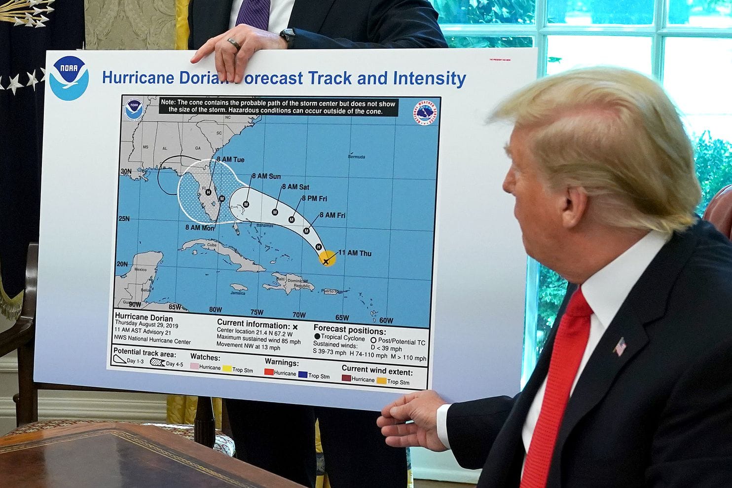 Trump refers to a map, modified using a Sharpie, while talking to reporters following a briefing from officials about Hurricane Dorian in the Oval Office at the White House on 4 September 2019. Photo: Chip Somodevilla / Getty Images