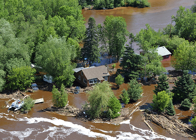 Aerial view of severely flooded areas of Fond du Lac, Minnesota, shown on 24 June 2012. Photo: Matthew Schofield / U.S. Coast Guard / Reuters