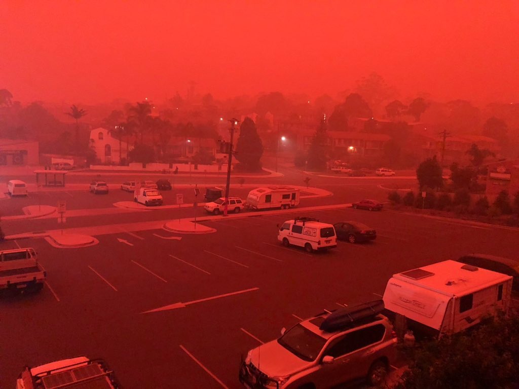 Smoke from bushfires in Australia turns the sky red in Merimbula at 7am, 4 January 2020. Photo: Tegan George / Network 10