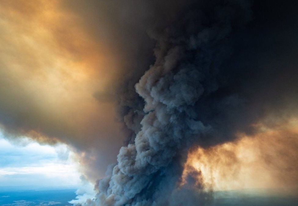 Aerial view of smoke rising from a bushfire burning at East Gippsland, Victoria, 2 January 2020. Photo: EPA / BBC News