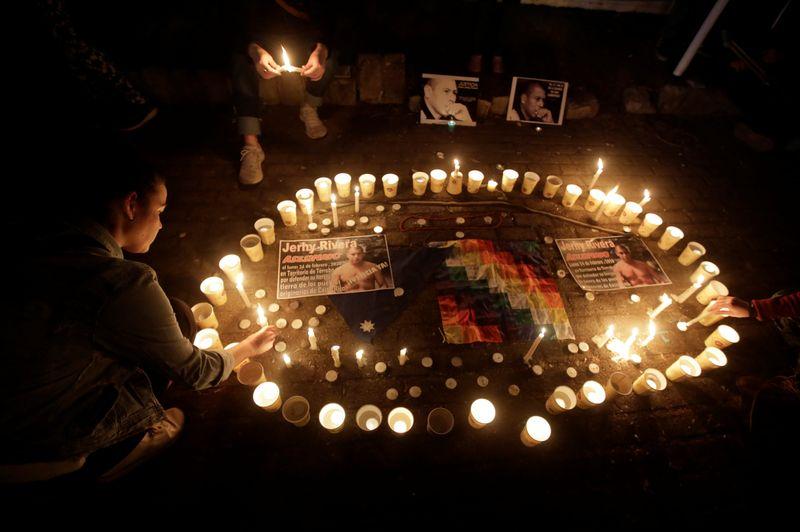 Activists light candles during a vigil on 25 February 2020 for Yehry Rivera, an indigenous leader from Costa Rica who was killed on Monday night, on 24 February 2020, in San Jose, Costa Rica. Photo: Juan Carlos Ulate / REUTERS
