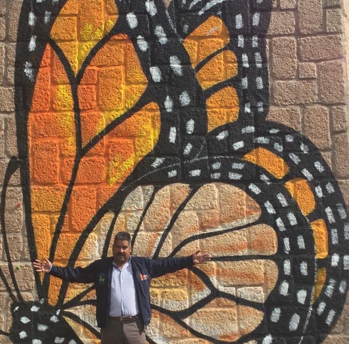Environmental activist Homero Gomez Gonzalez stands in front of a monarch butterfly mural, 28 December 2019. He was murdered by an illegal logging criminal syndicate, and his body was found in a well on 29 January 2020. Photo: Homero Gomez Gonzalez / Facebook