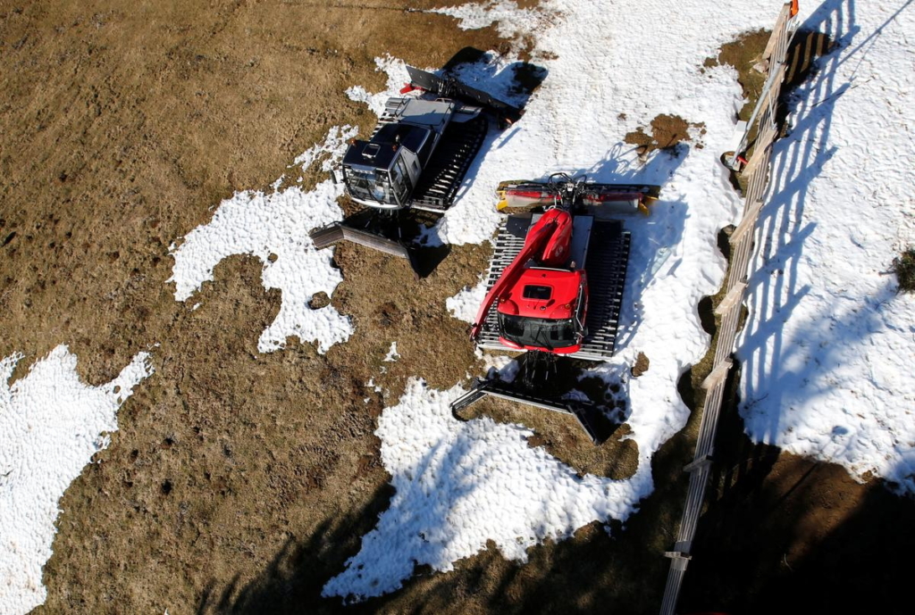 Snow groomers are pictured at the ski resort of The Mourtis, as the ski slopes are closed due to lack of snow in Boutx, France, 10 February 2020. Photo: Regis Duvignau / REUTERS