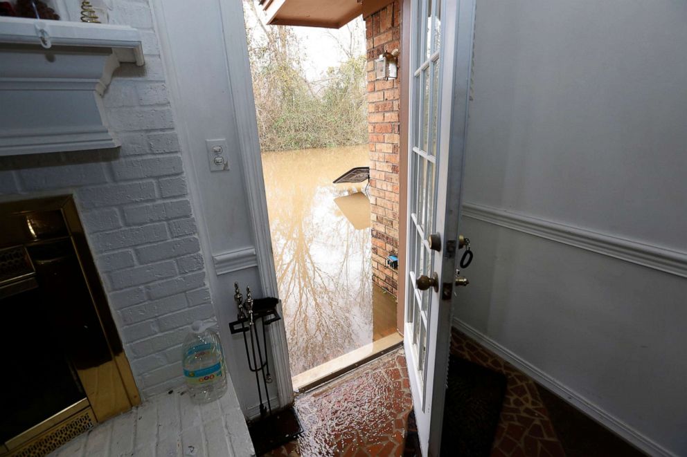 Water from the Pearl River enters this northeast Jackson, Mississippi, home, on 16 February 2020. Photo: Rogelio V. Solis / AP
