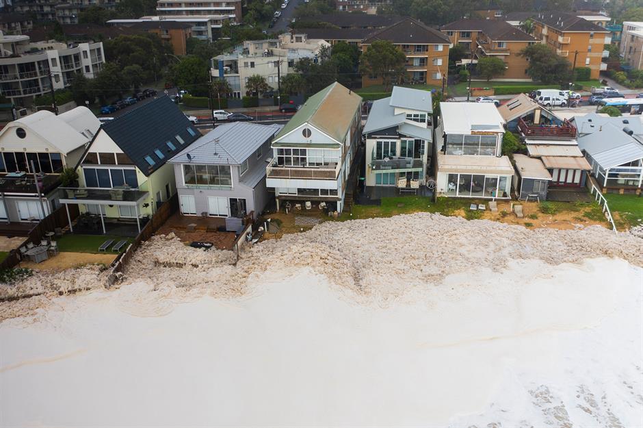 Aerial view of beachfront homes in Collaroy, New South Wales, Australia threatened by encroaching surf. Photo: Brook Mitchell / Stringer / Getty
