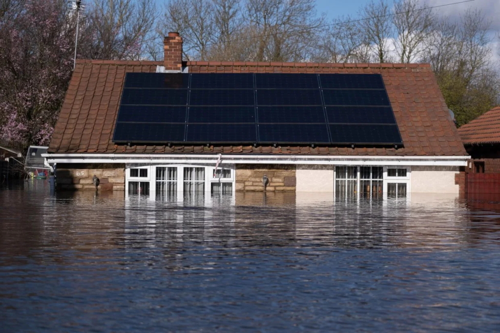 Aerial view of a submerged house after heavy flooding in the East Yorkshire town of Snaith in February 2020. Photo: South West News Service