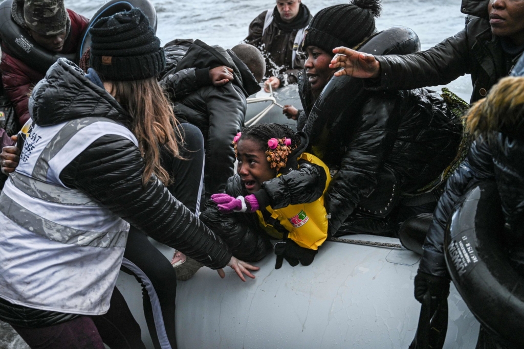 Twenty-seven migrants on a dinghy originating from Gambia and the Republic of Congo landed on the Greek island of Lesbos on Saturday, 29 February 2020. Photo: Aris Messinis / Agence France-Presse / Getty Images