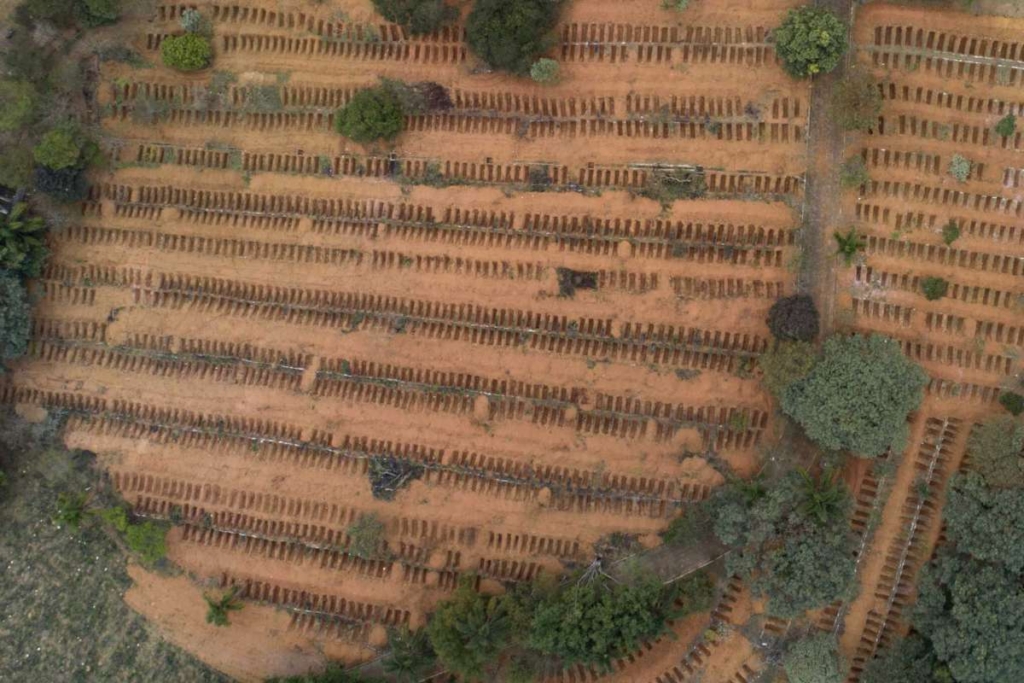 Aerial view of newly dug, empty graves filling the Sao Luiz cemetery, where COVID-19 victims will be buried in São Paulo, Brazil, 4 June 2020. Photo: Andre Penner / AP