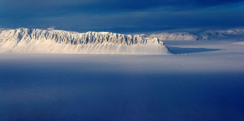 Eureka Sound on Ellesmere Island in the Canadian Arctic is seen in a NASA Operation IceBridge survey picture taken 25 March 2014. The Canadian Ice Service announced on 2 August 2020 that the Milne Ice Shelf, at the fringe of Ellesmere Island, had collapsed due to global warming. Photo: Michael Studinger / NASA / REUTERS