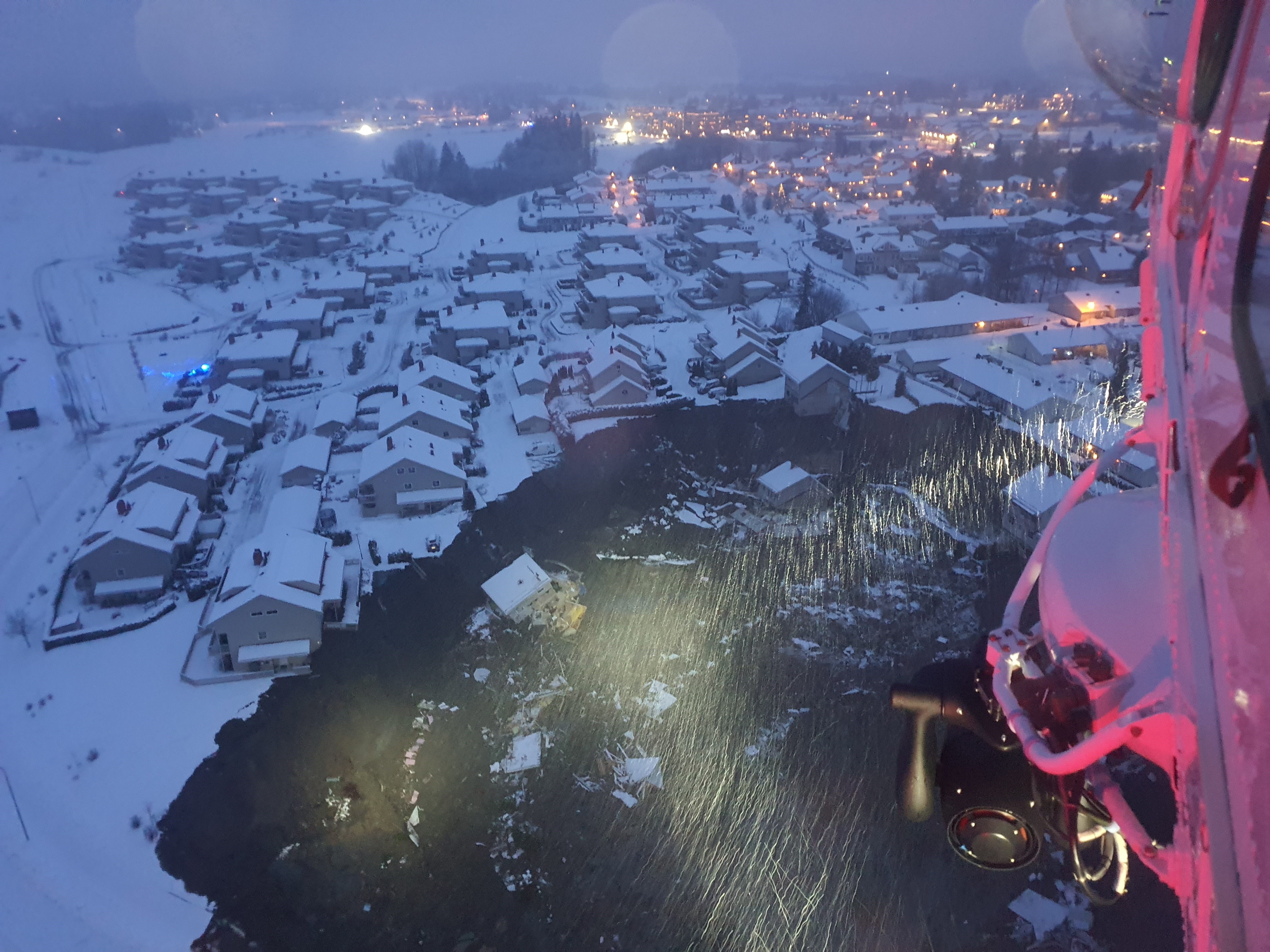 Aerial view from a rescue helicopter over the area of a landslide in the village Ask, Gjerdrum municipality, Norway, 30 December 2020. Photo: NTB / Norwegian Rescue Service