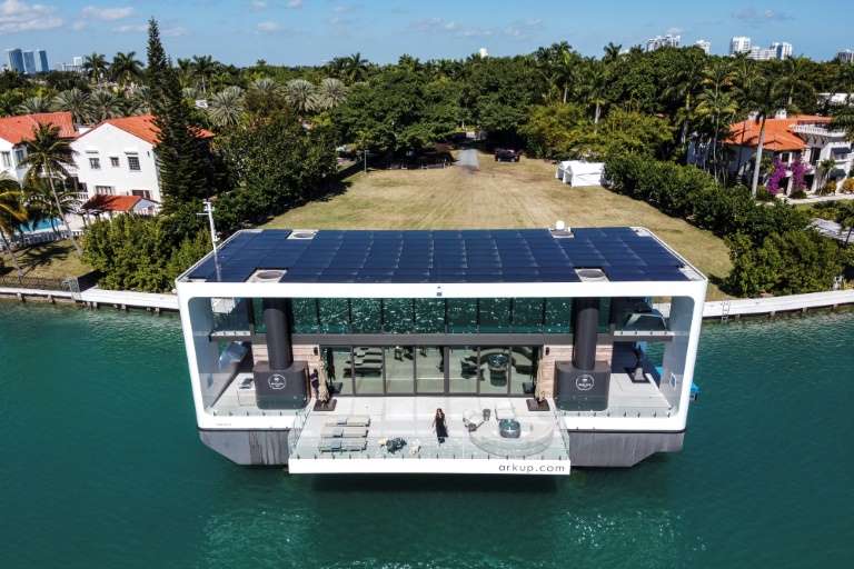 The Arkup luxury floating villa docked at Star Island in Miami Beach, Florida, on 5 February 2021. It costs $5.5 million and adjusts to the rising sea levels that are threatening Florida. The house, covered with a roof of solar panels, remains stable thanks to four hydraulic pillars that fix it to an underwater bed. Photo: Chandan Khanna / AFP
