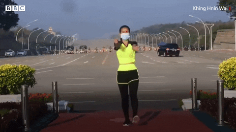 A fitness instructor accidentally caught part of Myanmar's military coup unfolding on camera in the country's capital, Naypyitaw. Aerobics teacher Khing Hnin Wai posted the footage to Facebook on Monday morning (1 February 2021), in the background, a convoy of armoured cars can be seen streaming by, suggesting all is not as it seems. At the time, the Myanmar army was in the process of detaining Aung San Suu Kyi and other democratically elected leaders from her party National League for Democracy. Video: Khing Hnin Wai / BBC News