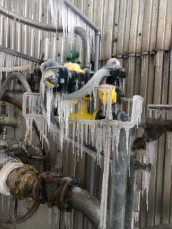 Ice coats machinery at the Entergy power plant in Houston, Texas, after Winter Storm Uri, 16 February 2021. Photo: Lauren Talarico / KHOU / Twitter