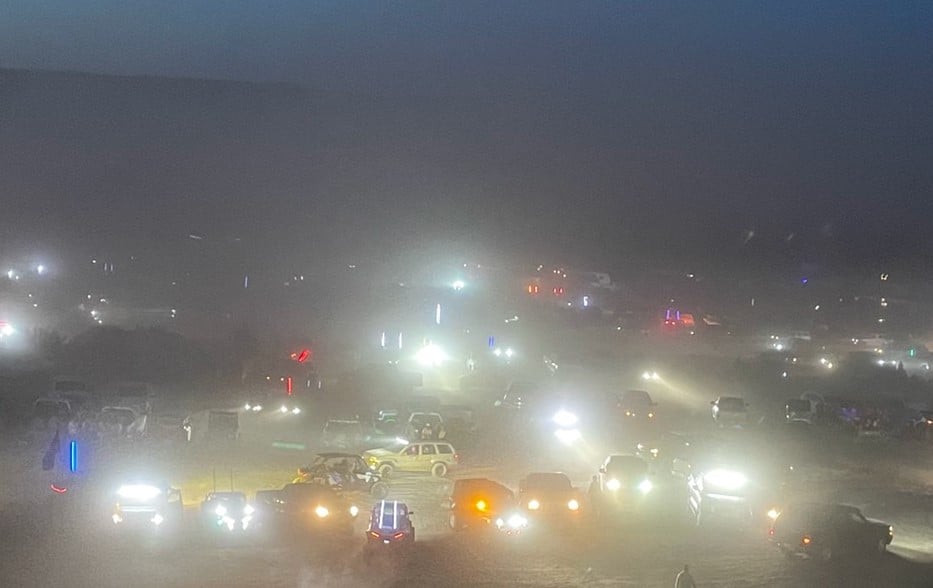 Dozens of vehicles are parked with their lights on at an illegal party at Tonto National Park on the night of 3 April 2021. The U.S. Forest Service estimated that more than 5,000 people gathered illegally. Photo: U.S. Forest Service