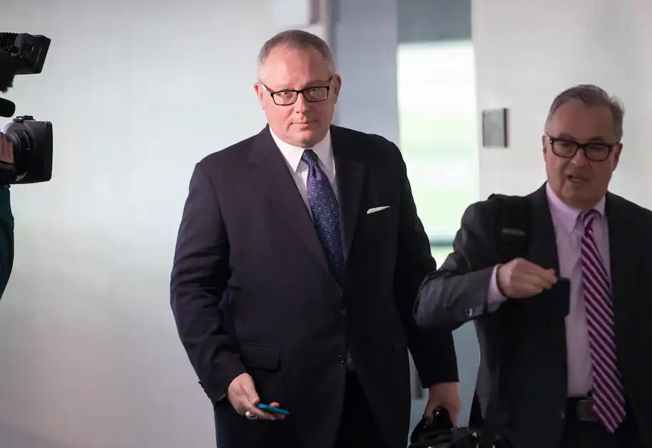 Former Trump administration official Michael Caputo, left, in 2018. Photo: J. Scott Applewhite / AP