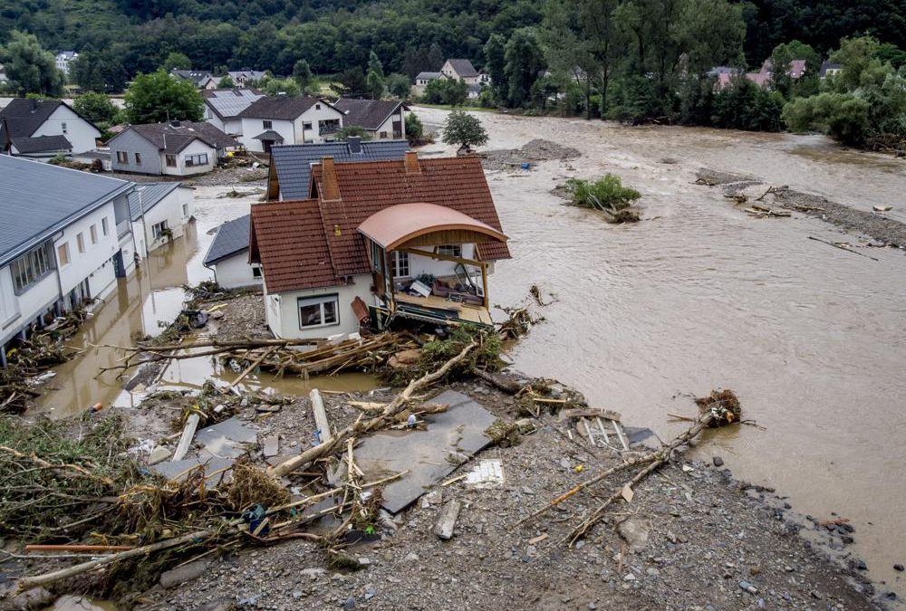 A damaged house is seen at the Ahr river in Insul, western Germany, 15 July 2021. Due to record rainfall the Ahr river dramatically went over the banks the evening before. At least 42 people died after record rainfall caused heavy flooding and turned streams and streets into raging torrents, sweeping away cars and causing some buildings to collapse. Photo: Michael Probst / AP Photo